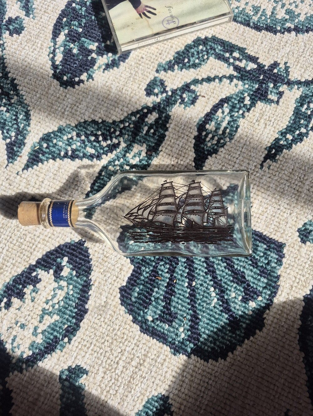 Clear Glass Ship-in-a-Bottle Decorative Bottle - Blue Cork Accent